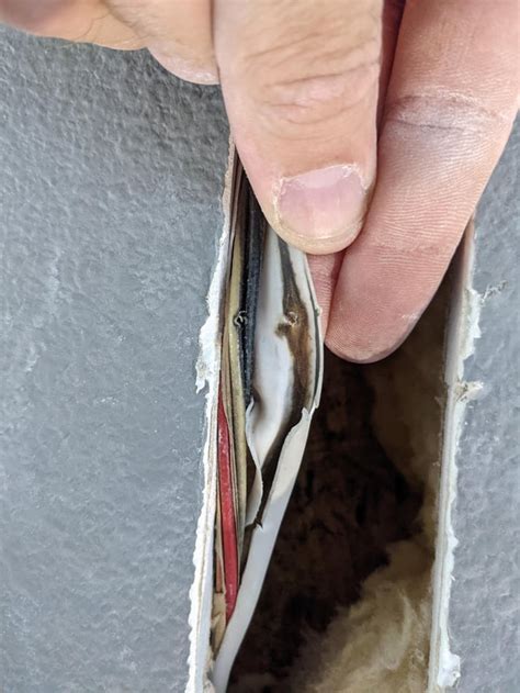 using b junction box repair cut like|Contractor shot staple through it .